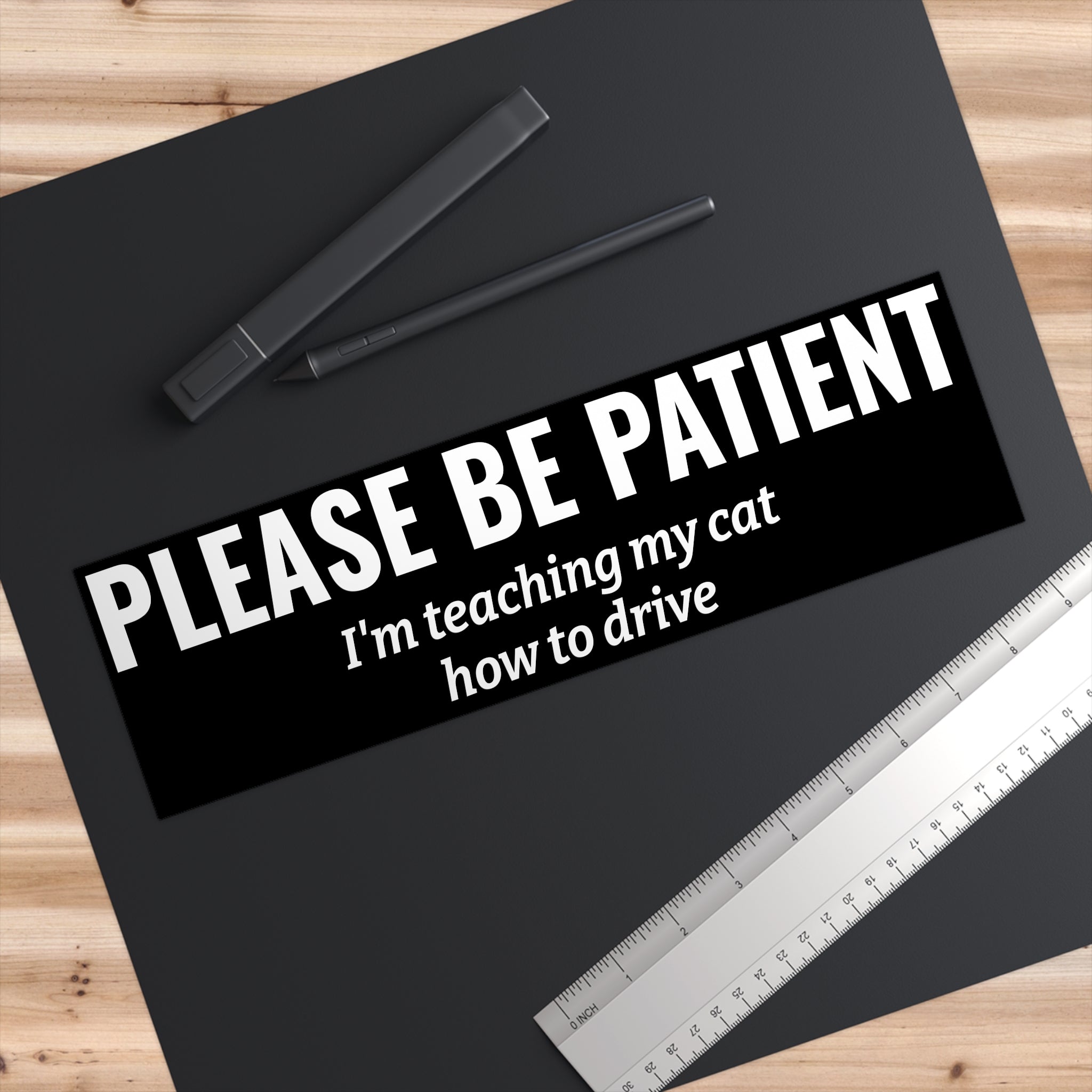 Copy of Copy of Please Be Patient Bumper Sticker — "I'm Teaching My Cat How to Drive" Humorous Car Decal (BLACK)